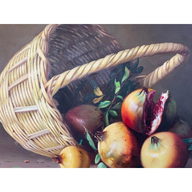 20th century painting of a still life of a basket and pomegranate fruits. Beautiful realistic detail and color. Lovely...