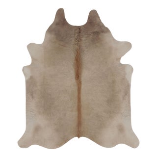 Rug & Kilim’s Large Cowhide Rug in Warm Beige and Cream Tones For Sale