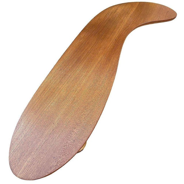 This beautifully restored biomorphic rattan table has a striking Paul Frankl-inspired mid-century design. It features two...