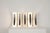 Set of 5 wall lights made of white painted aluminum and chrome. Designed by Goffredo Reggiani, Italy 1970s. Two E 14...