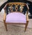 A truly iconic mid 20th century Hollywood regency style gold barrel back chair in the style of Dorothy Draper, made by...