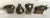 Here is a lovely set made by Dansk of a cat, bear, elephant and bull silver animal figurine that can serve as a...