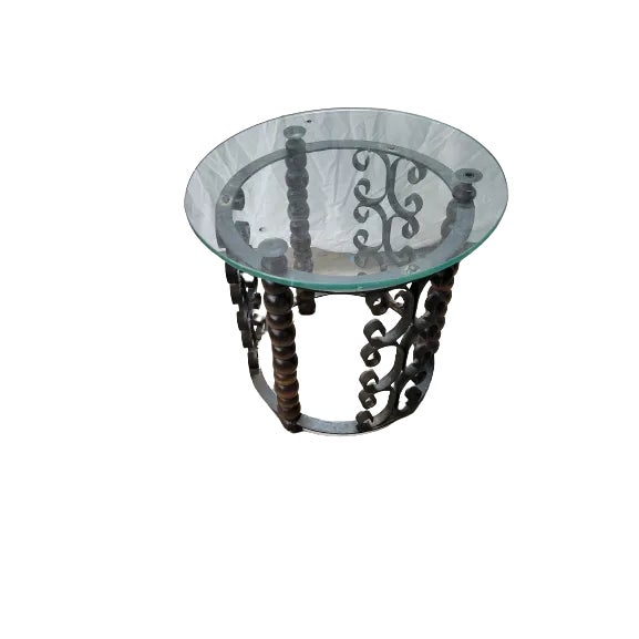 Vintage of side tables stand at 17 inches tall and features a round black wrought iron base with a diameter of 16 inches....