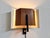 Very rare wall light in plywood and metal, made by Philips in the early 1960s. This could possibly be a design by Louis...