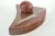 Large vintage artisan carved iron red fossil stone wedge shape stand accentuates the extinct Devonian Period marine animal...