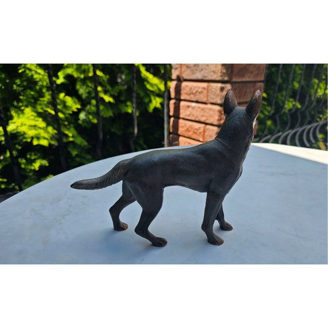 Vintage brass German Shepherd figurine (1960s–70s), dimensions: height 14 cm, width 16 cm, depth 3.7 cm.
