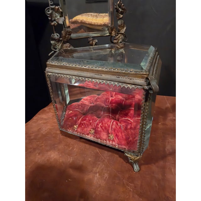 Charming 19th century French wedding jewelry box with tufted velvet bottom interior surface, beveled glass edges, and worn...