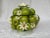 The cheeriest cookie jar around! From Inarco’s fruit-centric line of ceramics, this Green Apples and Daisies cookie jar...