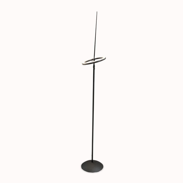 The Ringelpiez Floor Lamp by Ingo Maurer and Team is a refined piece of contemporary German lighting design, balancing...