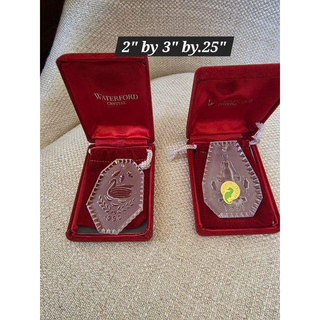 Waterford Crystal Christmas Ornaments from 1990 and 1991 in original boxes.
