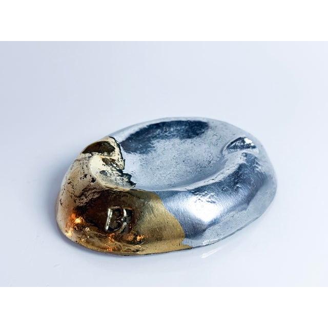 Brutalist Aluminium and Brass Ashtray, 1970s, in Very Good conditions. Designed 1970 to 1979 This piece has an attribution...