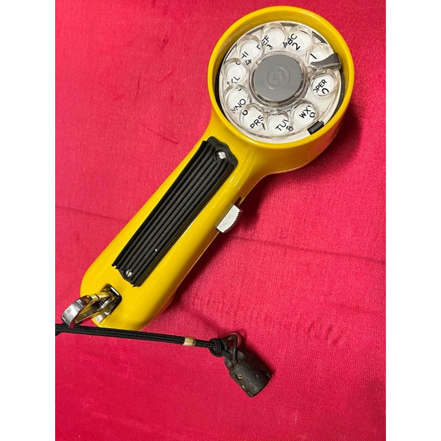 Great Vintage item that can be used as a paper weight. Yellow Western Electric Telephone Bell System Rotary Line Tester....