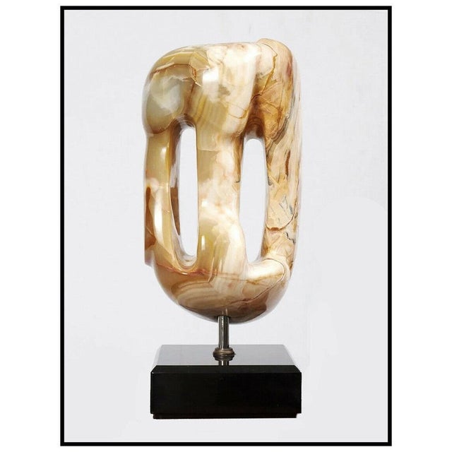 This high quality, and Authentic Anthony Quinn Sculpture titled, "The Gates" is completed delicately with contoured faces...