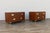An exceptional pair of Mid-Century Modern campaign-style nightstands by Milling Road Furniture, a division of Baker...