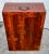 Antique (1900s) Trunk on Stand is Asian. Made of Wood that has been Painted a Cinnabar Color with a Design. Brass Handles....