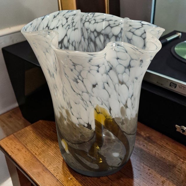 This vintage Mid-Century-Modern Italian art glass vase is a unique and handmade piece that exudes a colorful and abstract...