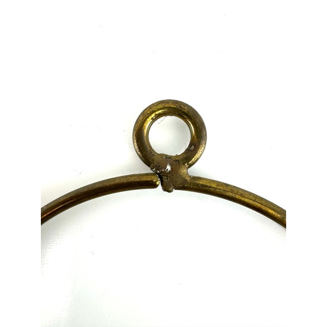 This vintage brass decorative key set features five classic skeleton-style keys gathered on a large brass ring designed...