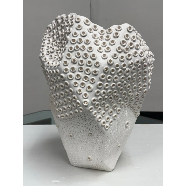 Design Plus Gallery presents a Contemporary White Textured Ceramic Sculptural Vase from Anthem SF. This decorative ceramic...