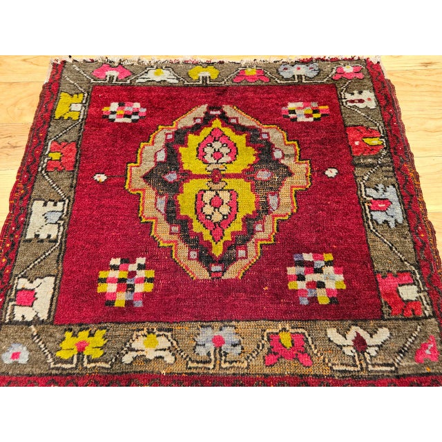 This early 20th century Turkish Oushak rug is a rare and exceptional find in a near-square format — a proportion highly...