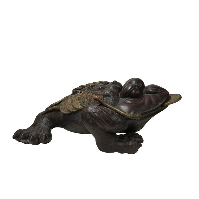 Invite good fortune and a touch of ancient mystique into your space with this exquisite large bronze money frog, also...