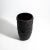 This exquisite vase features a luxurious matte onyx black exterior with polished beveled edges that mimic the texture of...