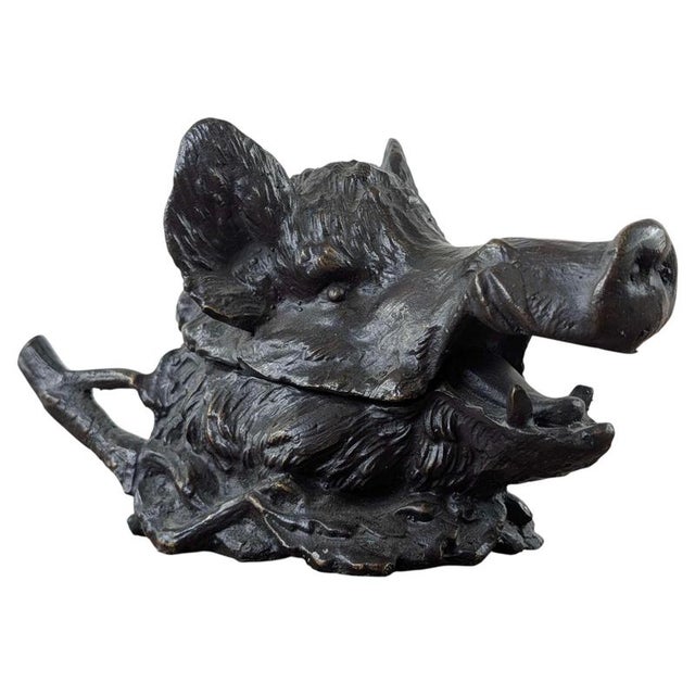 A striking French patinated bronze boar’s head inkwell dating to circa 1890–1910, based on a design by the celebrated...