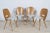 This set of four ’Lollipop’ dining chairs was produced by Tatra in former Czechoslovakia circa 1960 and designed by...