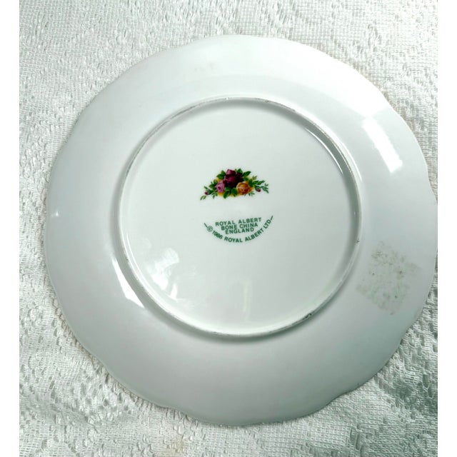 A beautiful decorative plate by Royal Albert with old country rose garden scenery.
