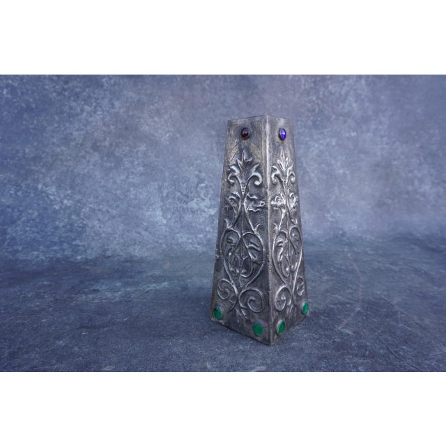 From the Arts and Crafts era and hand chased. This 4 sides vessel has glass stones set in each side. This magical object...