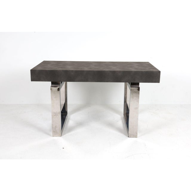 Custom made console table or desk by Tailored Home in Norwalk, CT. It has chrome steel legs with wrapped top. Tailored...