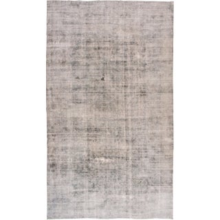 Early 20th Century Distressed Antique Persian Kerman Wool Rug For Sale