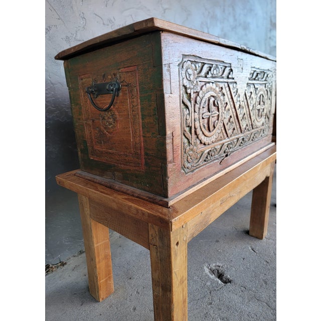 Two hand carved and painted wood dowry chests from Bali. Included are contemporary hand made rustic stands appropriately...