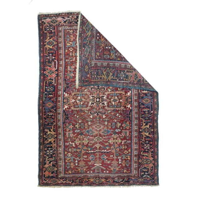 The numerous rugs of the famous NW Persian weaving district, from small scatters to giant carpets and a few runners, in...