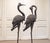 Impressive pair of large decorative crane sculptures, made in Sweden during the 1970s and executed in patinated bronze....