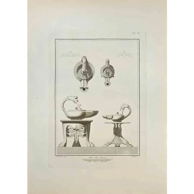 Still Life from "Antiquities of Herculaneum" is an etching on paper realized by Carlo Oraty in the 18th Century. Signed on...