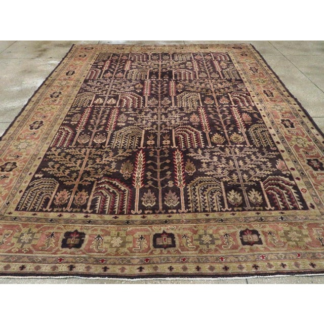 An antique Turkish Oushak room size carpet. This western Turkish workshop Oushak carpet adheres closely to Persian Heriz...
