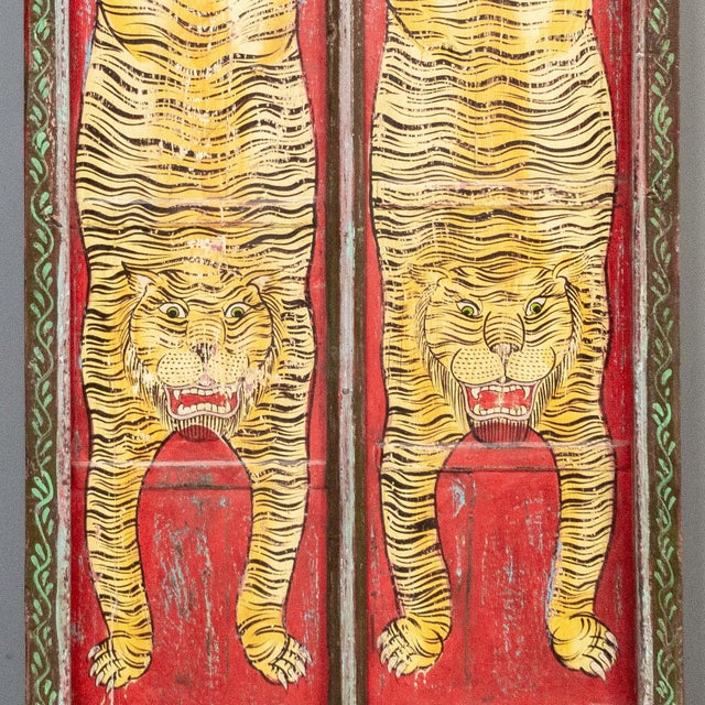 Antique pair of Rajasthani doors joined together, and freshly painted in a folk art style, featuring two tigers. A great...