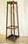 English antique Arts and Crafts coat stand, having four double coat and hat hook above eight single hooks on four square...
