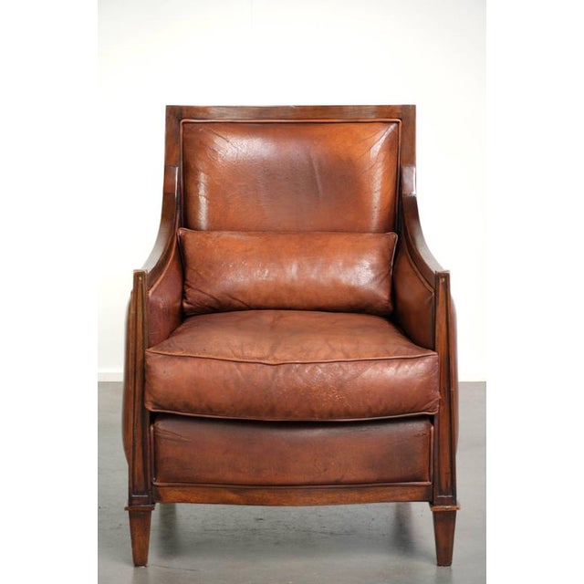 This characterful sheepskin Art Deco design armchair with a wonderfully comfortable seat and beautiful warm colors. : This...