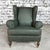 Dimensions: H 38.9” x W 36.8” x SD 23.6” x SH 20" Dutch Wingback armchair with roll arms and front legs on caster wheels....