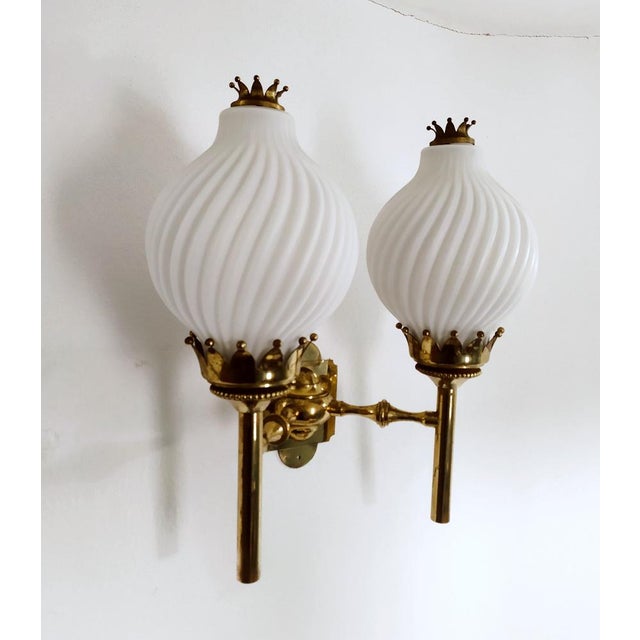 This lamp is very rare and is the first version of the model published on page 346, model 12904, in the Arredoluce general...