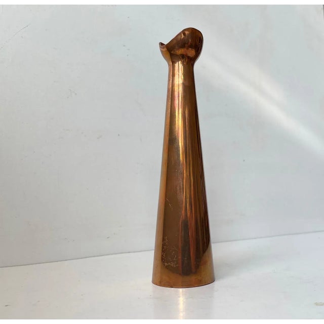 Handmade light copper vase with a delicately executed mouth/top piece. Anonymous Scandinavian metalworker circa 1960 in...