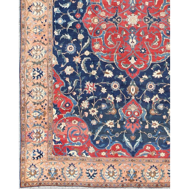 Antique Large Persian Tabriz Rug with Large Flowers On A Navy Background. Antique Persian Tabriz. Keivan Woven Arts / rug...