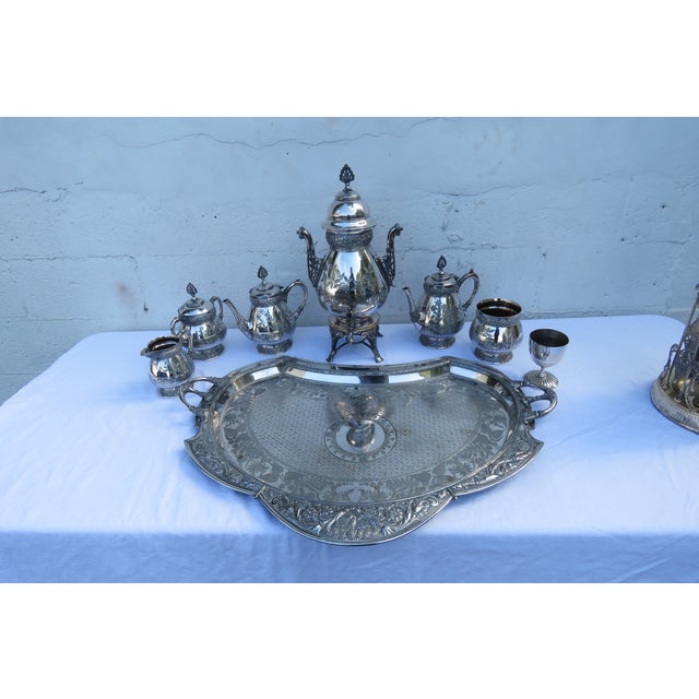 This gorgeous Victorian style Tea/Coffee Serving Set is silver plated and engraved with gorgeous floral motifs. This...
