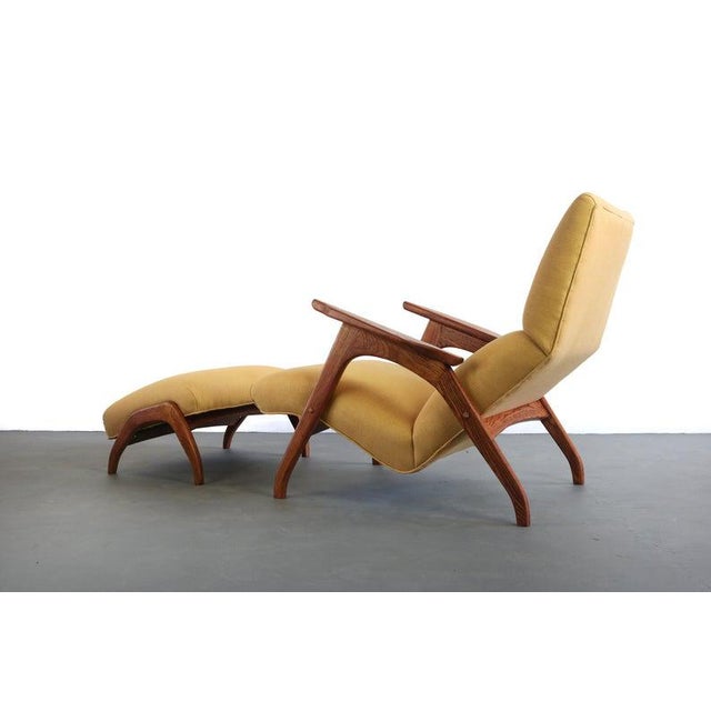 This lounge chair has been reupholstered in marigold and the frame has been professionally refinished. -- Ottoman --...