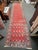 Design Plus Gallery presents a 3ft 8in × 16ft Hand-Knotted Persian Runner. The runner rug showcases a red field with...