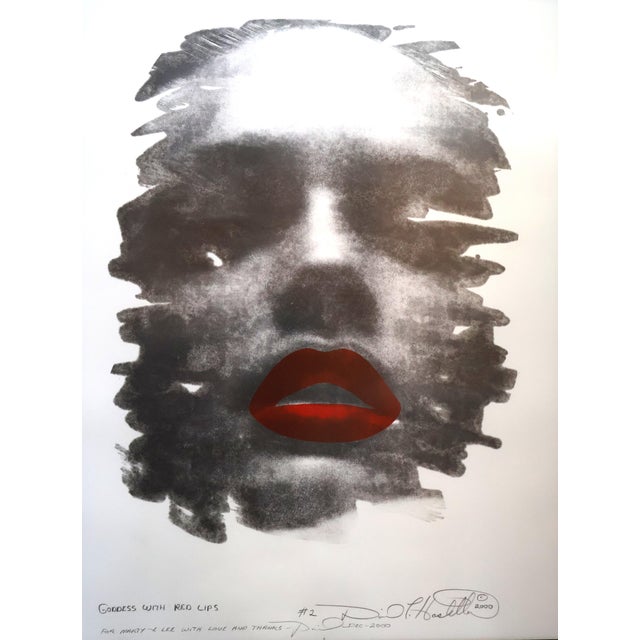 A striking signed and numbered lithograph, "Goddess with Red Lips," 2000, by American sculptor David Hostetler (1926–2015)...