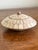 A sleek and highly distinctive Maitland-Smith vintage tessellated bone trinket box featuring an organic, low-profile...