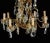 Chandelier in Brass with Eight Candleholders, in Good conditions. Designed 1920 to 1949 Up to 250V (Europe/UK...