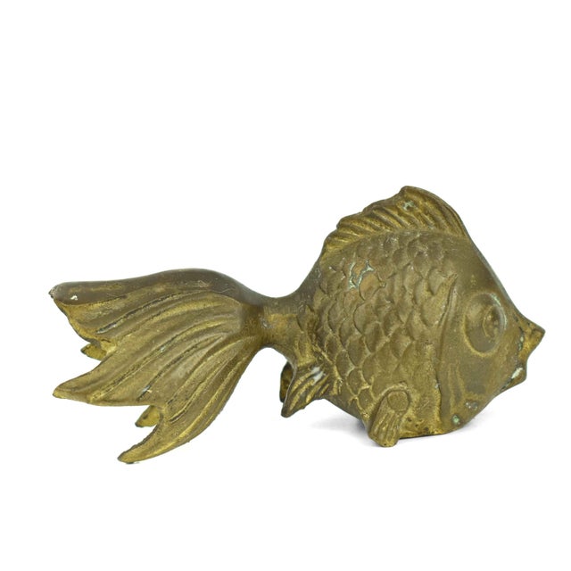 Add a whimsical touch of vintage charm to your home with this solid brass goldfish figurine. Expertly crafted with a focus...